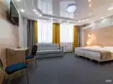 Джуниор сюит улучшенный с одной двуспальной или двумя односпальными кроватями на выбор