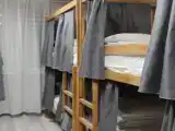 Кровать в общем номере (мужской номер)