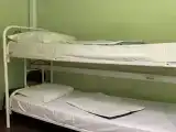 Кровать в общем номере (мужской номер)