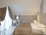 Стандартный трехместный номер с балконом