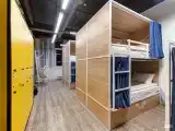 Кровать в 10-и местном общем номере