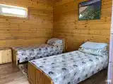 Номер стандарт с 2 односпальными кроватями в коттедже