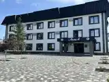 Двухкомнатный номер Стандарт Бизнес улучшенный  с одной двухспальной кроватью 203