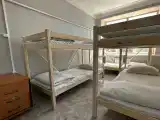 Кровать в 10-местном общем номере