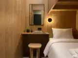 Капсульный номер с удобствами на этаже
