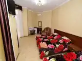 Комната люкс с 4 односпальными кроватями