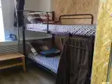 Кровать нижняя в 14-местном общем мужском номере