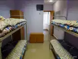 Кровать в 8-местном общем мужском номере