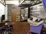 Улучшенный семейный номер  2 с  двухспальной кроватью и  двухспальным диваном