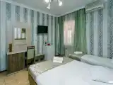 Трёхместный номер Standard с балконом и с видом на город
