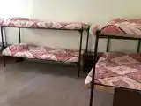 Кровать в 6-местном общем мужском номере