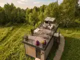 Дом с террасой на крыше с горячей купелью