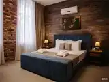 Полулюкс с большой двухместной кроватью в стиле лофт