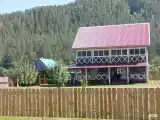 Коттедж с балконом и с красивым видом из окна