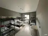 Кровать в 8-местном общем номере (общие удобства)