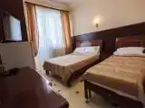 Стандартный трехместный номер с балконом