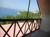 Трехместный мансардный номер с видом на море