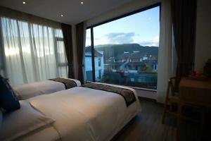 Lijiang Stay Long Guest House, Лицзян