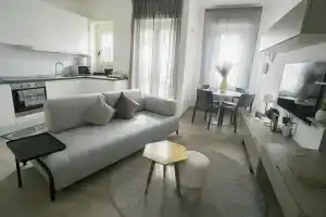 Charming and Modern Three-bedroom Apartment in the Heart of the City of Asti, Асти
