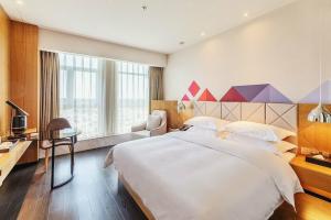 The Borrman Hotel Kunming Kmg, Куньмин