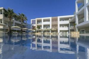 Mythos Suites Hotel, Тигаки