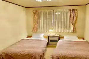 Pension Blue Bell, Кусацу