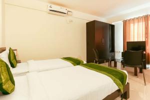 Treebo Trip Hotel Worldtree Prashant Extension, Бангалор