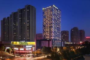 Madison Hotel Luoyang Wangfujing Wangcheng Park, Лоян