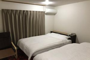 Business Hotel Tenmonkan Park - Hostel, Кагосима