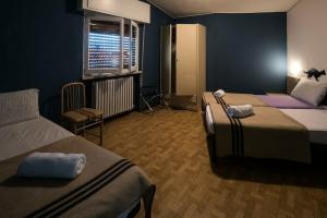 Colors Hostel, Тосколано-Мадерно