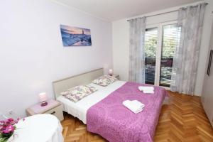 Room Violeta, Ровинь