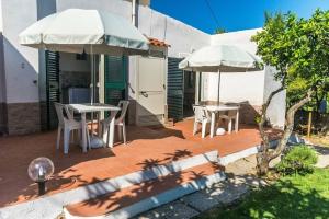 Residenza i Gechi, Тропея