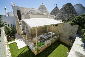 Hermanas Relais - trulli luxury, Альберобелло