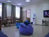 Спальное место на двухъярусной кровати в общем номере для мужчин и женщин