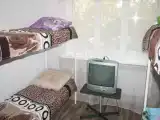 Спальное место на двухъярусной кровати в общем номере для мужчин