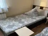 Номер стандарт с 2 односпальными кроватями (удобства на этаже)