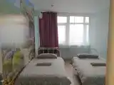Двухместный номер с 2 отдельными кроватями и общей ванной комнатой
