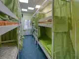 Место в восьмиместной мужской комнате
