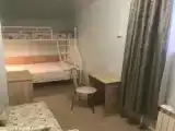 Трехместный номер с общей ванной комнатой