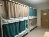 Четырехместный номер эконом-класса с общей ванной комнатой
