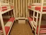 Кровать в общем номере для женщин с 4 кроватями