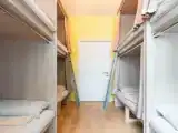 Общий номер для мужчин и женщин с 8 кроватями