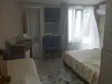 Трехместный номер с балконом