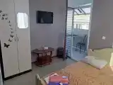 Трехместный номер с балконом