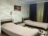 Небольшой двухместный номер с 2 отдельными кроватями