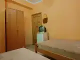 Трёхместный Стандартный номер с общей ванной комнатой