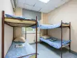 Кровать в общем номере для женщин с 4 кроватями