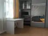 Стандартный двухместный номер с диваном и общей ванной комнатой