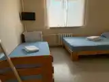 Трехместный номер эконом-класса с общими удобствами на этаже