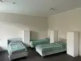 Односпальная кровать в общем номере